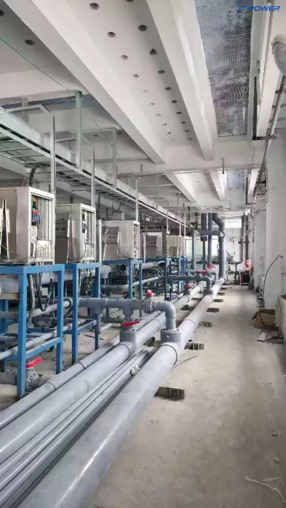 电化学除磷装置现场照片，展示处理槽与配套直流电源设备